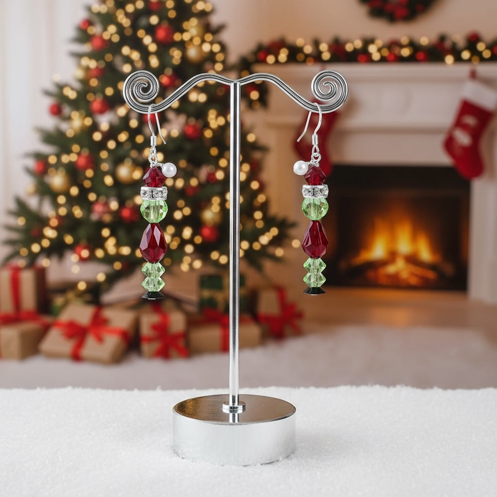 Sparkling Grinch earrings on a Christmas Themed Background