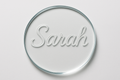 I need a circle of glass with the name Sarah engraved on it.